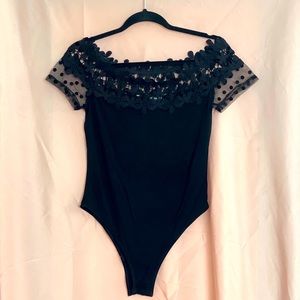 Off the shoulder shirt/bodysuit